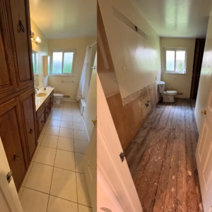 tile and fixtures removed from residential bathroom